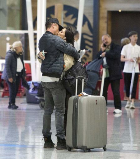 Josh Duhamel and the model Audra Mari were seen being romantic at the airport.